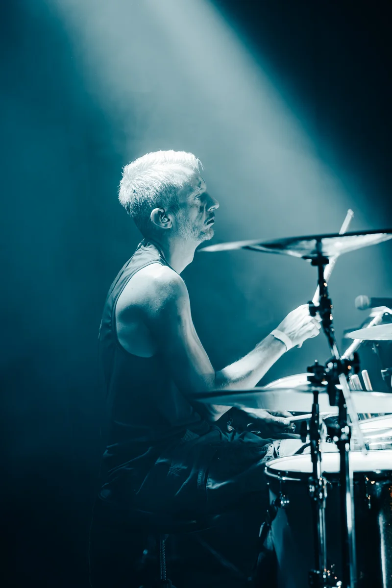 RawmanPictures - Sebastian Schiefermayr | Krampusnacht 2025 | Drummer in concert lighting, creating dynamic energy and rhythm on stage. Live music photography.